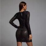 Back view of a woman wearing a black cutout bodycon dress